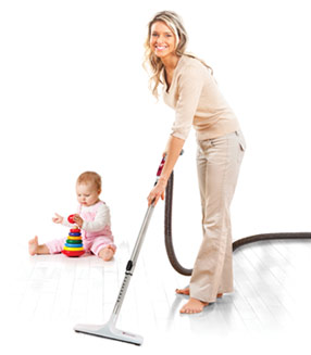Mother vacuuming